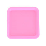 Silicone rolling tray in pink, perfectly square.
